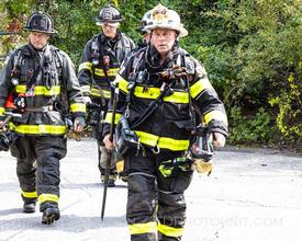 Pleasant Valley firefighters, led by Assistant Chief John Cronk, getting ready to enter the building. 