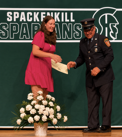 Ashleigh Burgess receiving her Arlington Fire District - Croft Corners Fire Company scholarship